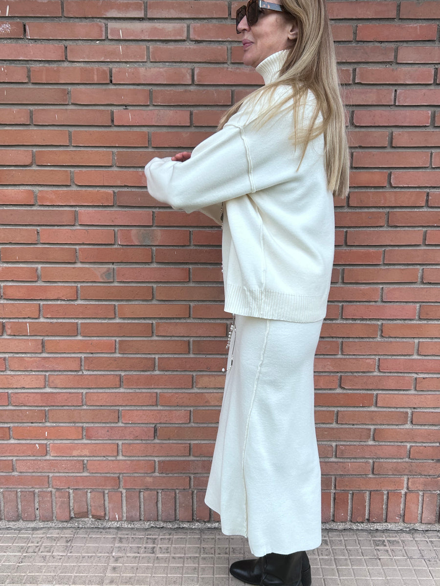 Conjunto de punto de jersey de cuello alto y falda recta