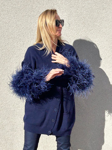 Knitted jacket with feather sleeves